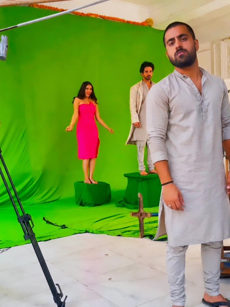 Chroma key green screen film production shoot with actors